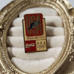 Coca Cola USA Track and Field Olympic Pin - Red and Gold